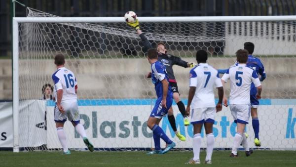 Olympia FC keeper Sean Lewis reels off one of a host of impressive saves as the Warriors eliminated South Melbourne FC.